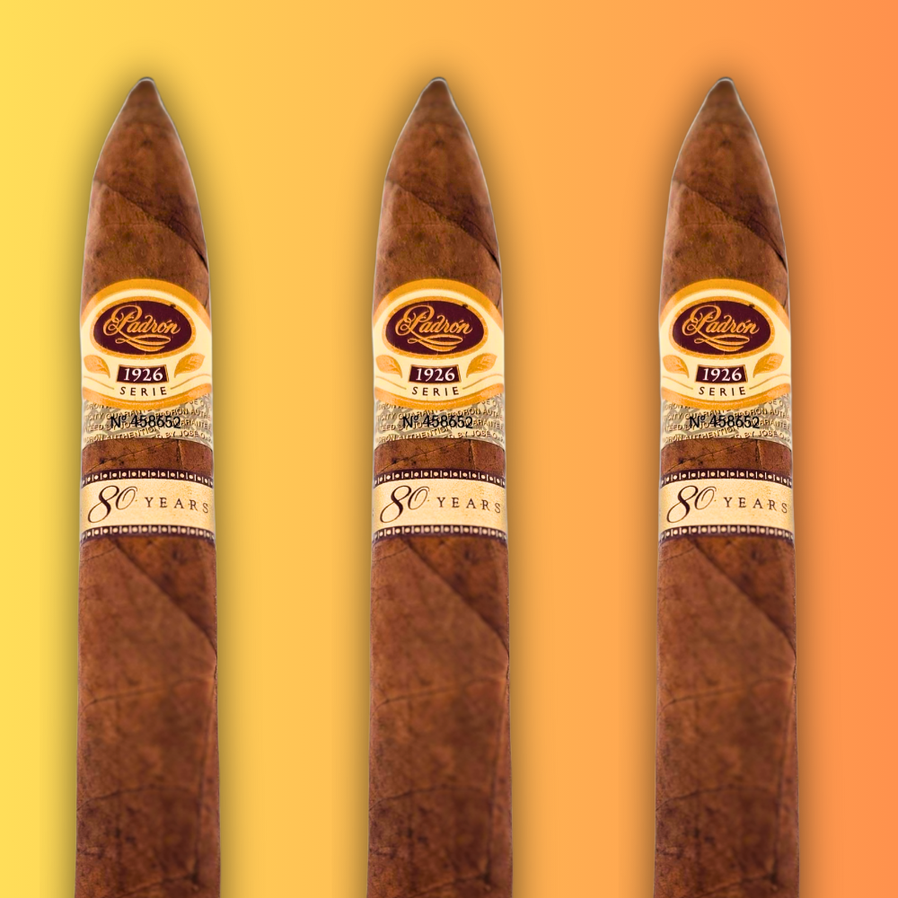 Box of Padron 1926 Series 80th Anniversary cigars with natural wood finish and branded interior lining.